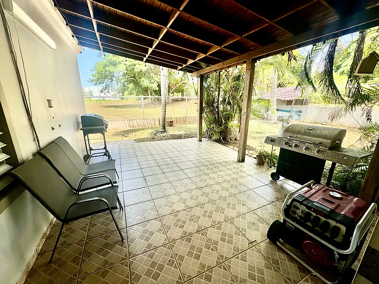 The house is equipped with a gas generator and transfer switch that connects to the electrical grid.
