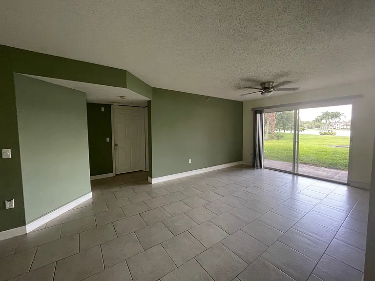 5005 Wiles Rd #102 — Photo 1
