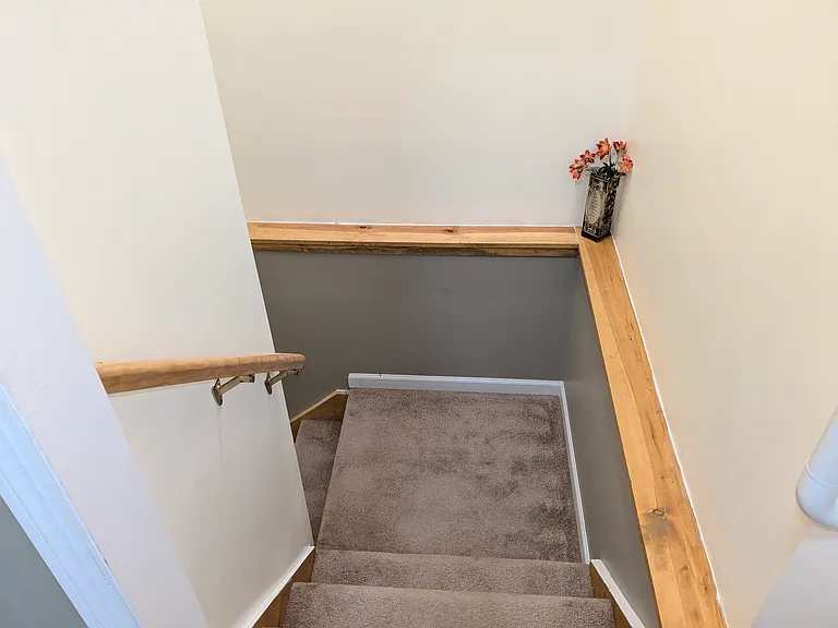 Stairs off Laundry room to basement