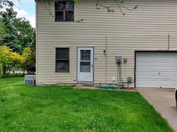 REAR ENTRANCE TO THE KITCHEN