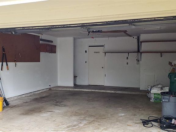 Clean, two car garage with lots of room for storage.