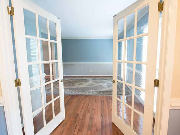 French Doors off Foyer.