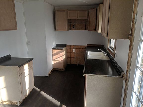Kitchen before cabinet painting.