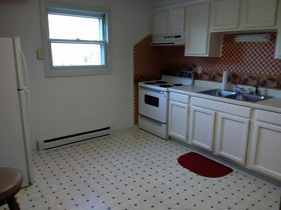 country kitchen with lots of cabinets