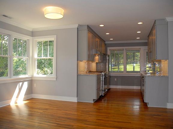 Dining area with kitchen beyond.