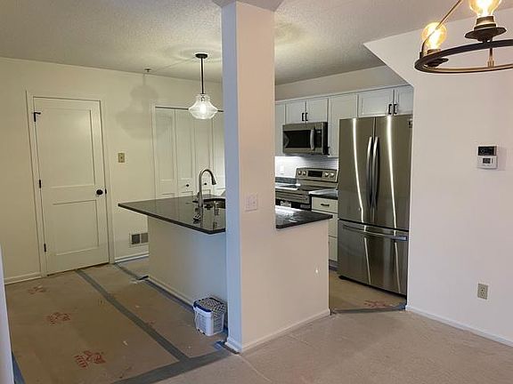 Bright open kitchen with adacent powder room
