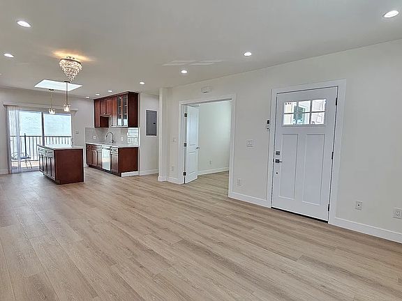 Front door and bedroom 1 view from living room.