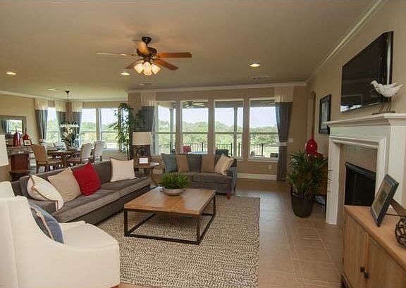 Great Room. Photo of Model Home with same Floor Plan, Not of Act