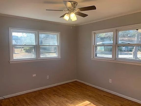One of the bedrooms on the back side of the house. Both bedrooms on the back side are similar with a bathroom in between them.