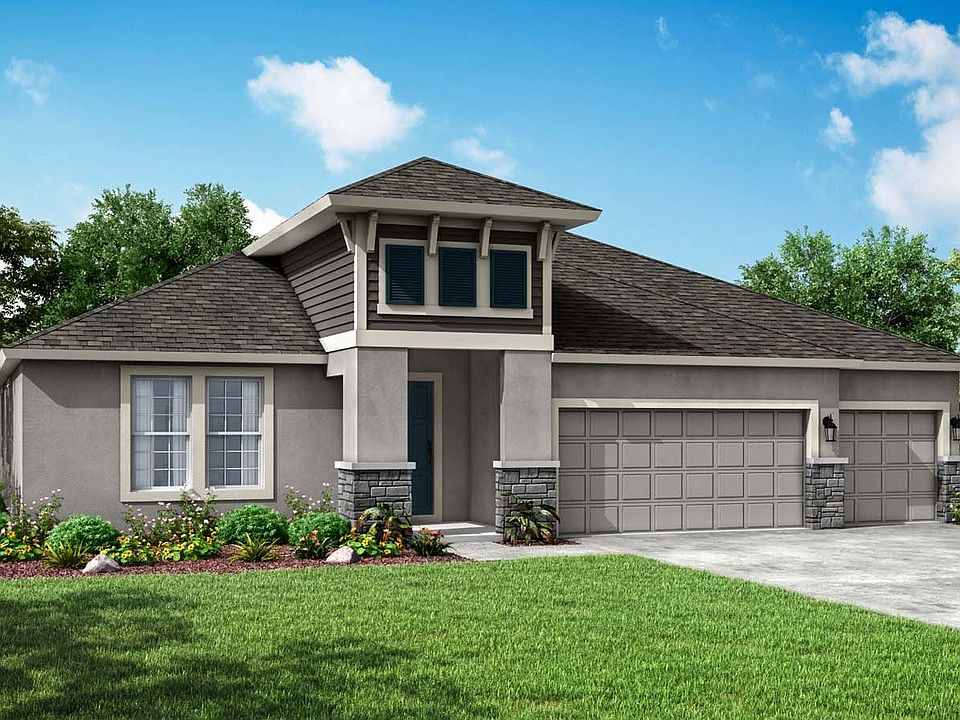 Sapphire new home exterior elevation coastal with optional stone William Ryan Homes Tampa