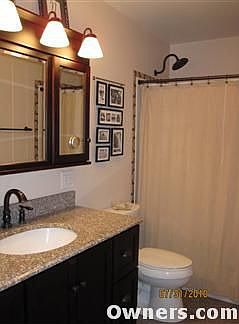 BR w/granite & solid cherry vanity.