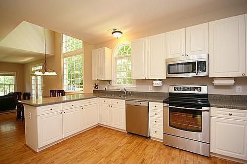 Kitchen - Stone countertops, brand new high-end appliances