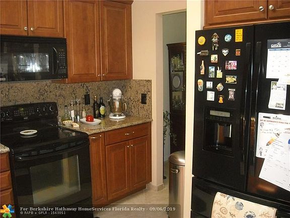 Soft close cabinets with granite countertops.