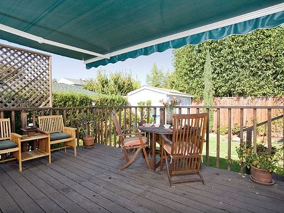 Spacious deck with retractable awning