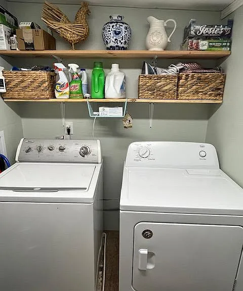 Washer and dryer included in the rental with extra storage space.