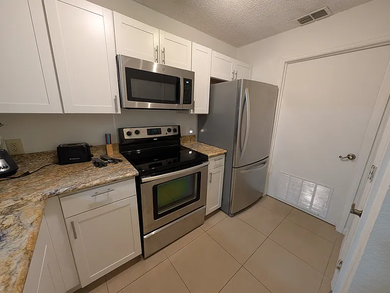 Kitchen, laundry room door, pantry door to the right
