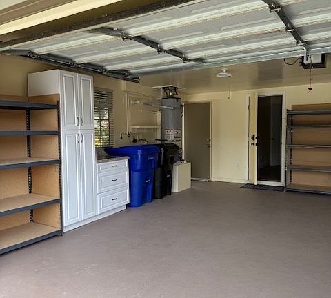 Garage with pantry and drawers