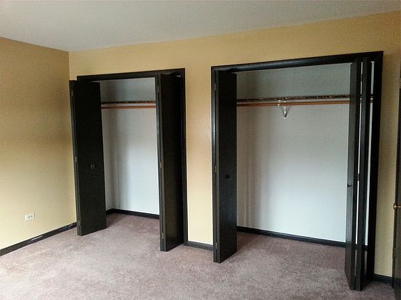 bedroom 2 with 2 large closets