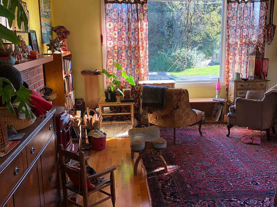 Living room looks East, with a green view
