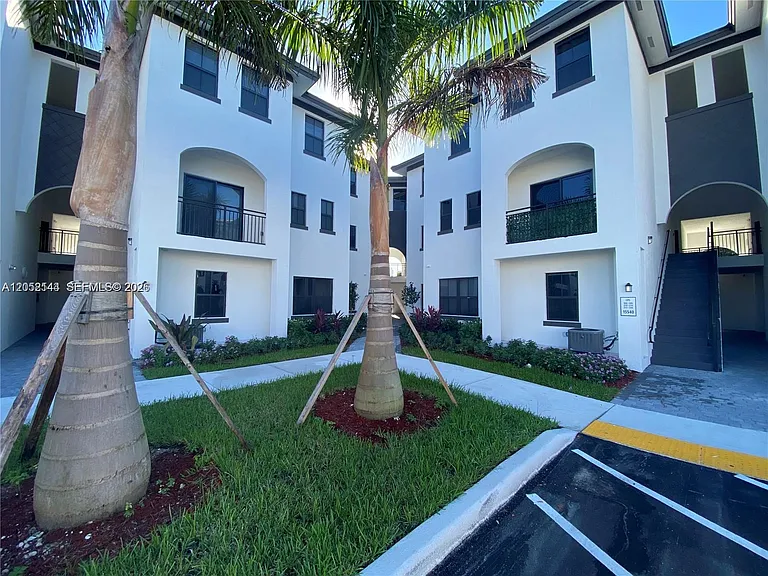 15540 SW 136th St #105 — Photo 1