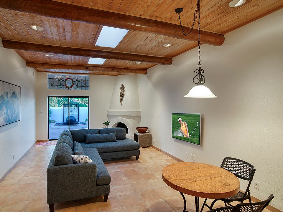 Main Living & Dining area - For demonstration purposes only, TV added digitally. Actual wall-mounted TV to come.