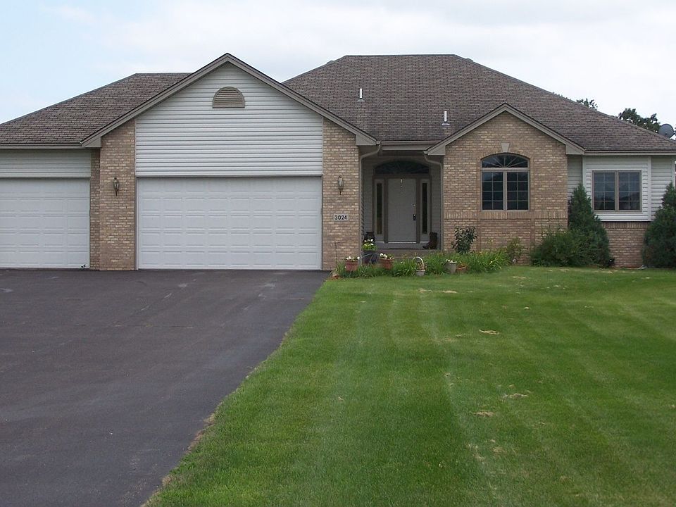 Situated on 2.6 acres, and undeveloped land to the side of the home.