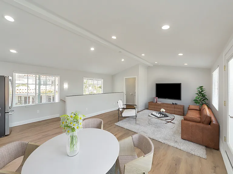 Bright, open living spaces with vaulted ceilings and abundant natural light.