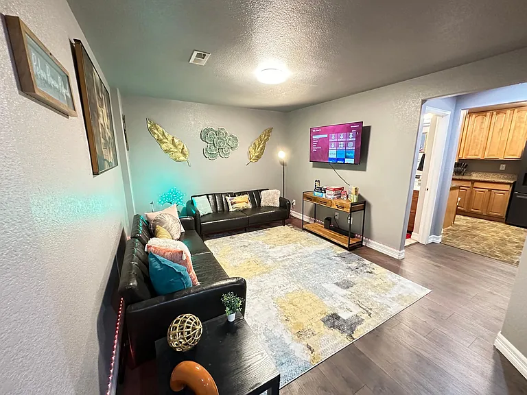 Come chill in our living room sanctuary_it's where comfort and fun hang out together!
