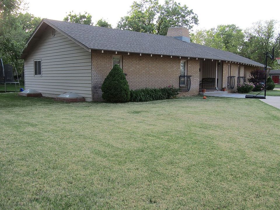 brick and vinyl home