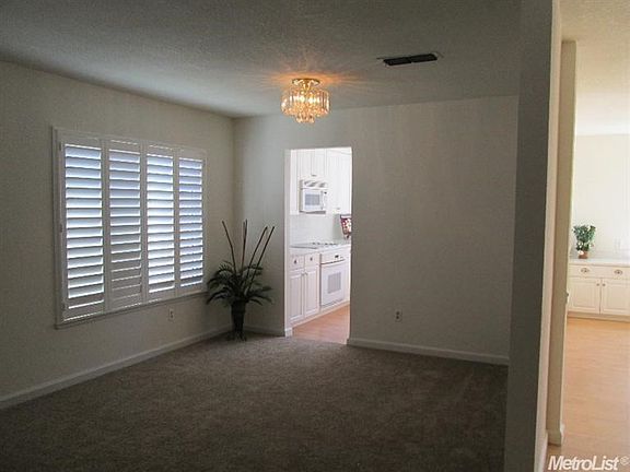 formal dining room between living room and kitchen