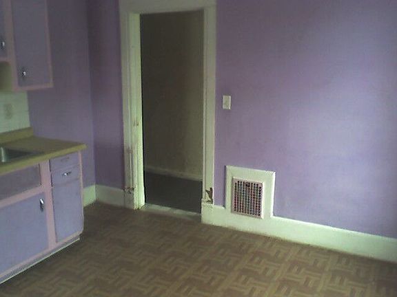 second floor bedroom (former kitchen)