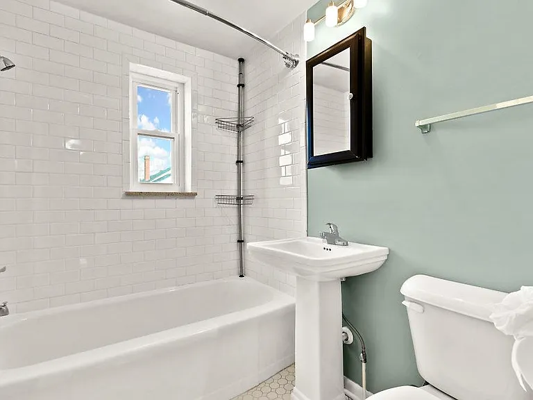 Updated Bathroom with New Vanity and ceramic subway tile
