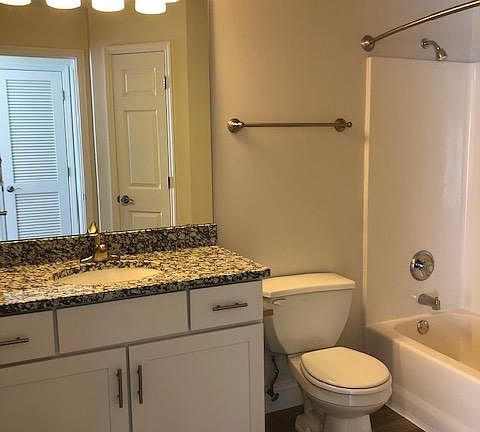 Spacious bathroom with all new fixtures and a linen closet