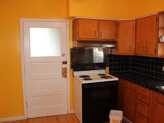 Kitchen with natural maple cabinest