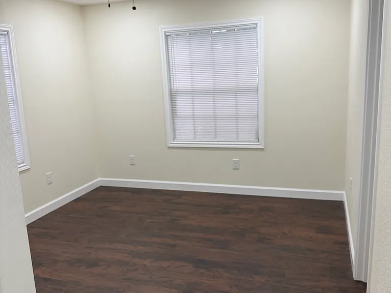 Master bedroom with private bathroom and walk-in closet