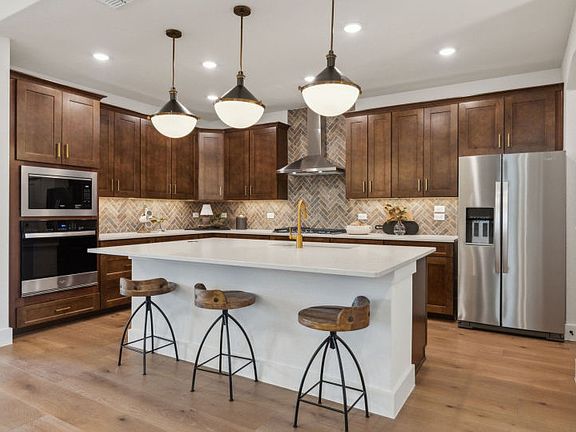 Spacious, island kitchen with eat-in bartop