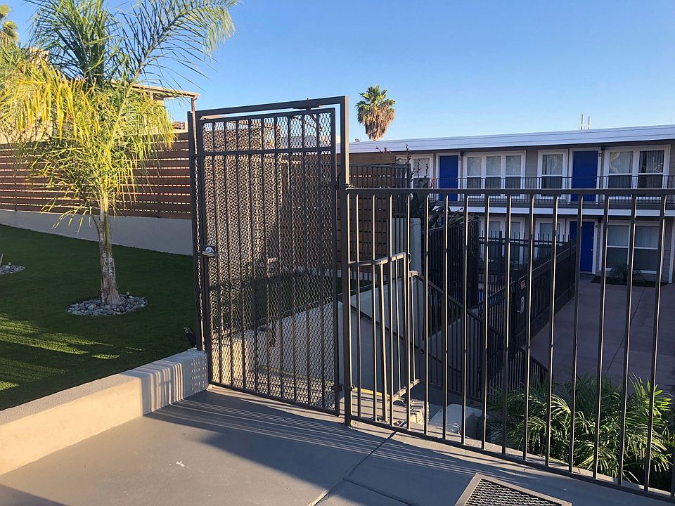 Front gate to 5747 Lauretta Street Apartments in San Diego, California.