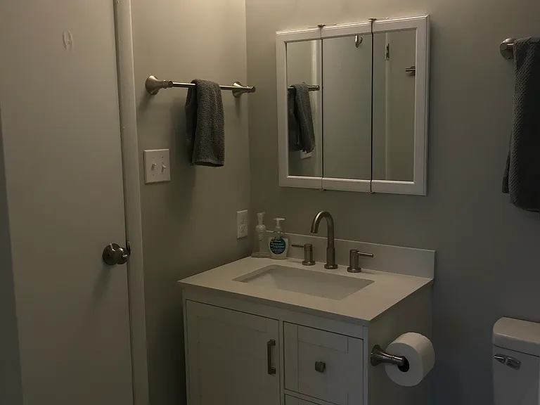 Upstairs bathroom new vanity and toilet.