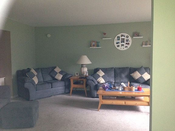 Large sized living room with natural windo lighting