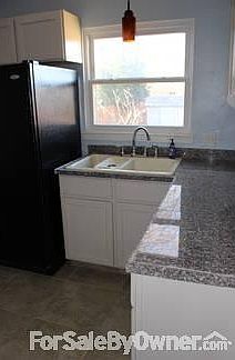 KITCHEN WITH GRANITE COUNTERTOPS