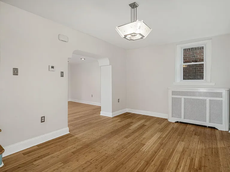 Dining room facing window and living room
