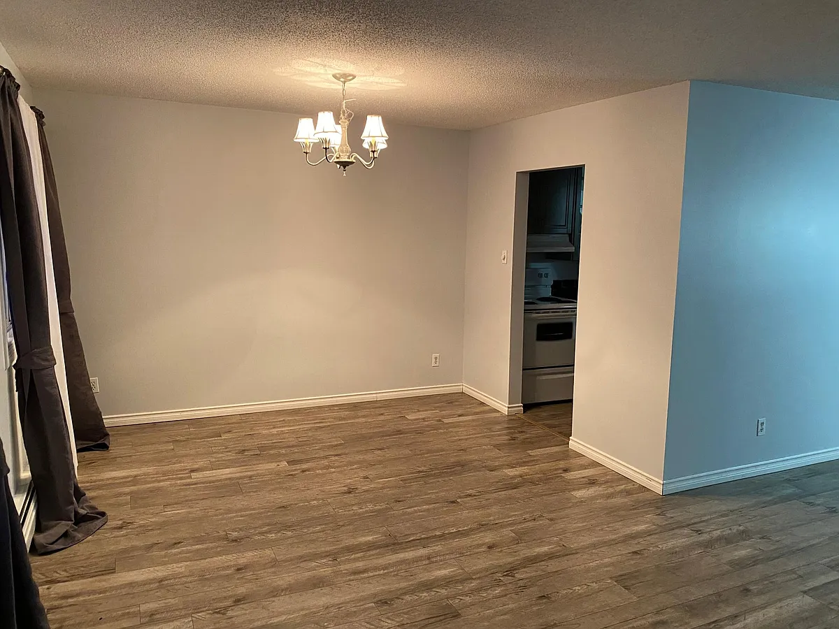 Area for dining table outside of kitchen - 5125 Riverbend Rd NW #417