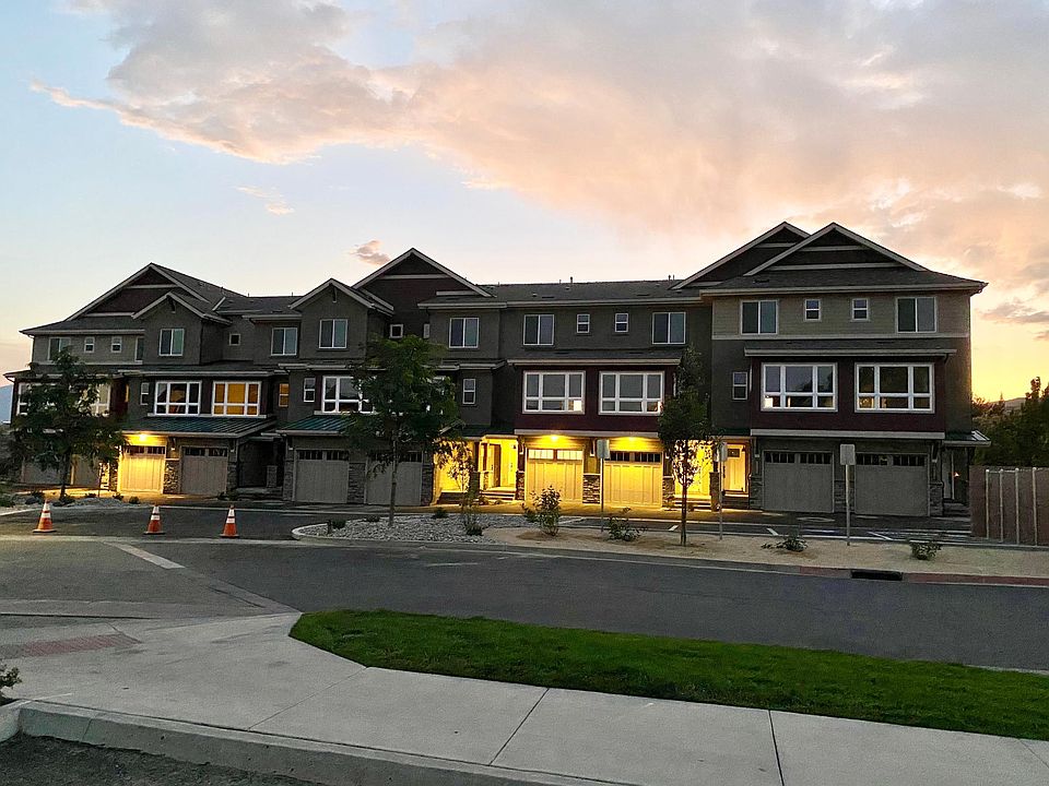 Front of building, unit is 4th garage door from right