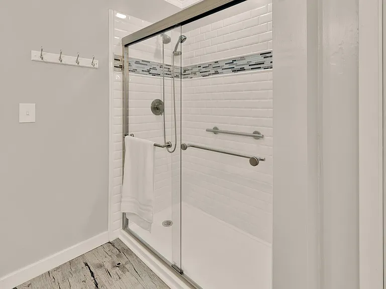 Shower in double sink bedroom