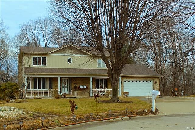 This custom home sits at the end of a cul-de-sac in a quiet subdivision right in the heart of town.