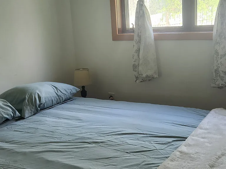 1st bedroom view from chair in room