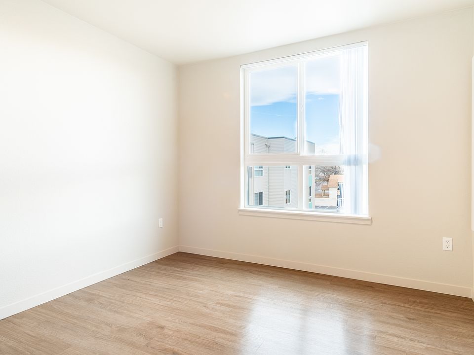 All bedrooms have oversized windows for abundant natural light.