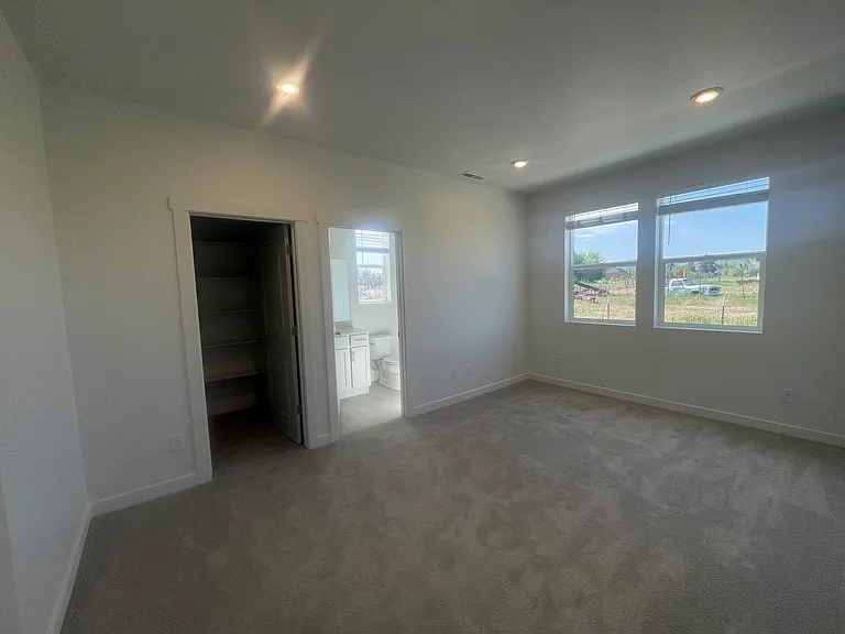 Main floor Primary bedroom with ensuite