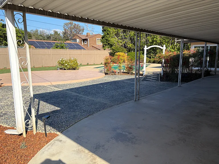 Backyard, covered patio and more