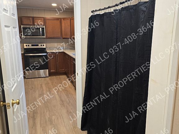 view of kitchen from full bath